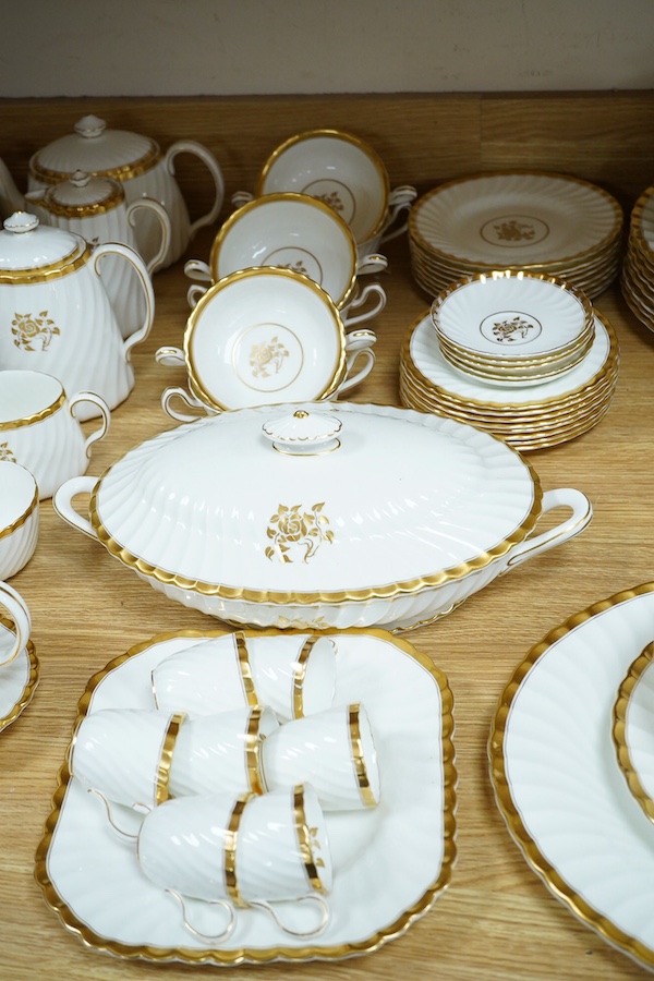 An extensive Minton ‘gold rose’ dinner and tea service. Condition - fair to good, tureen cracked